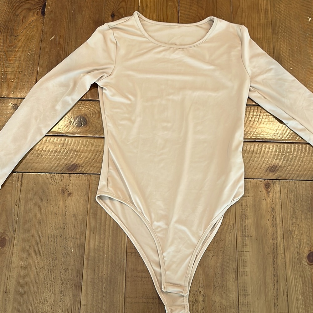 Tan color body suit